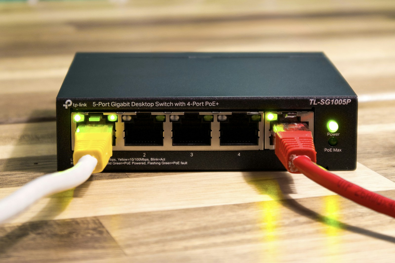 A network switch with ethernet cables connected