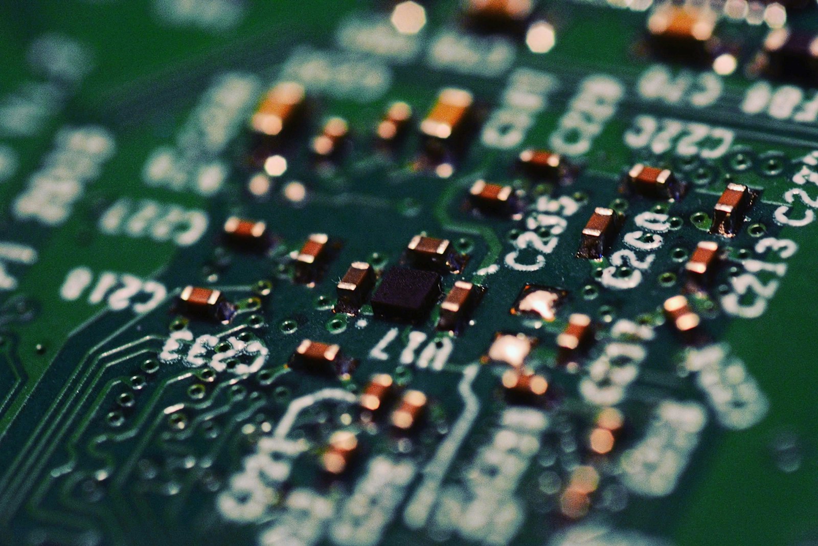 Close-up of a green circuit board with components