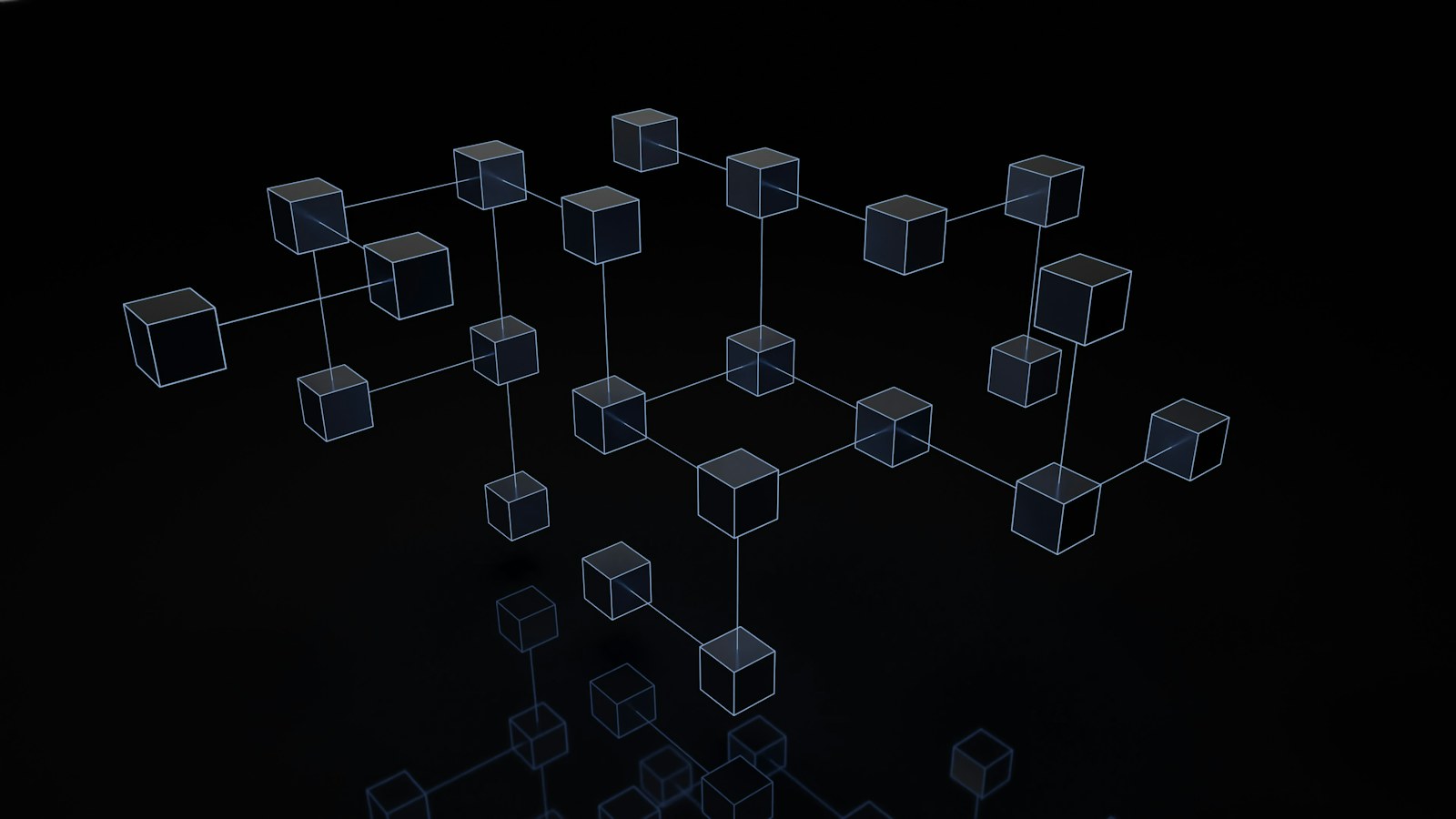 a black and white photo of cubes on a black background