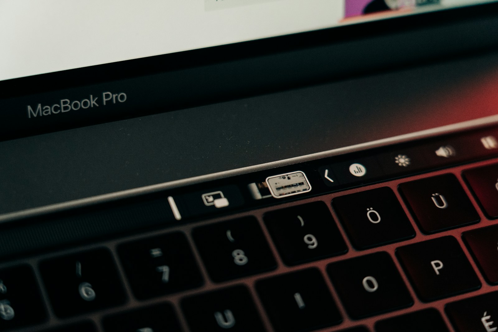 black and silver macbook pro