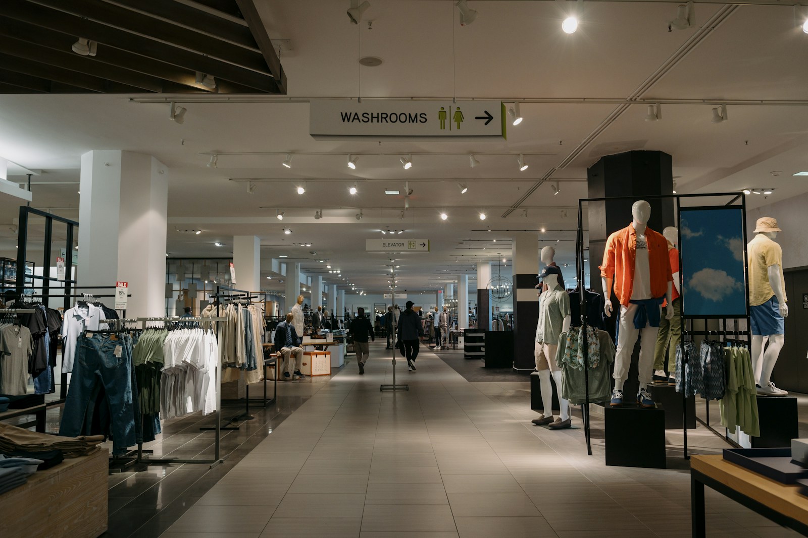 Inside of a department store with clothes on display