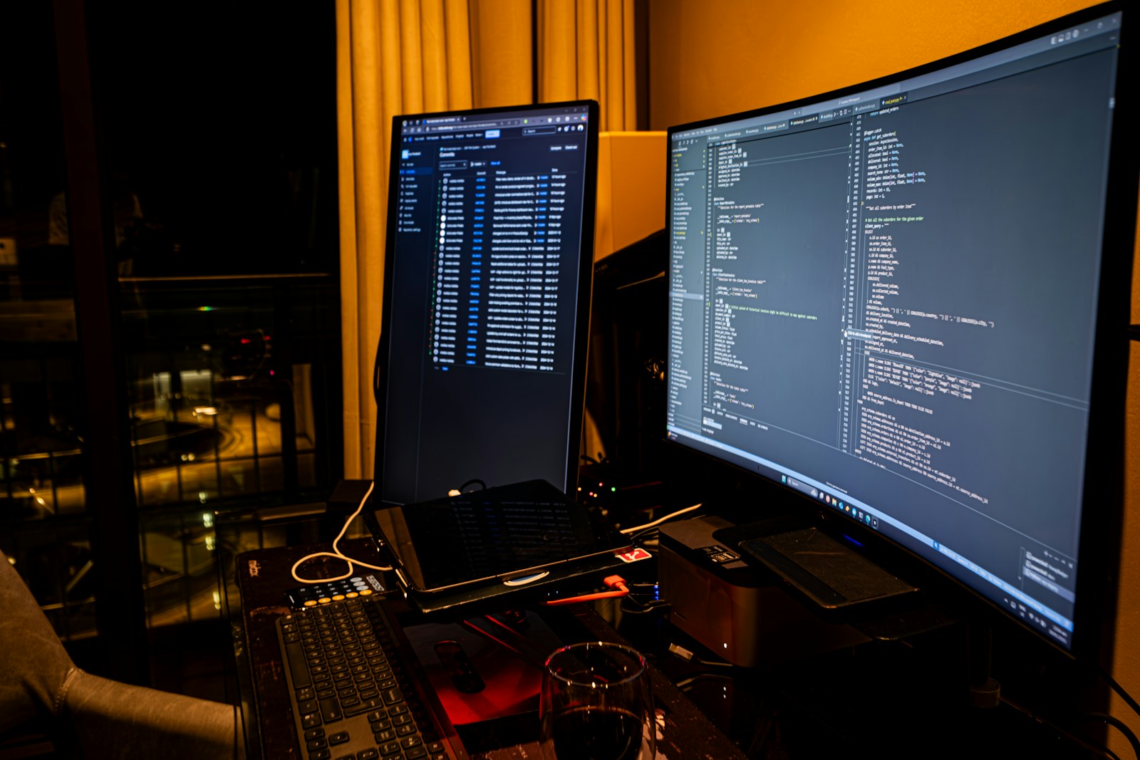 A man sitting in front of a computer monitor