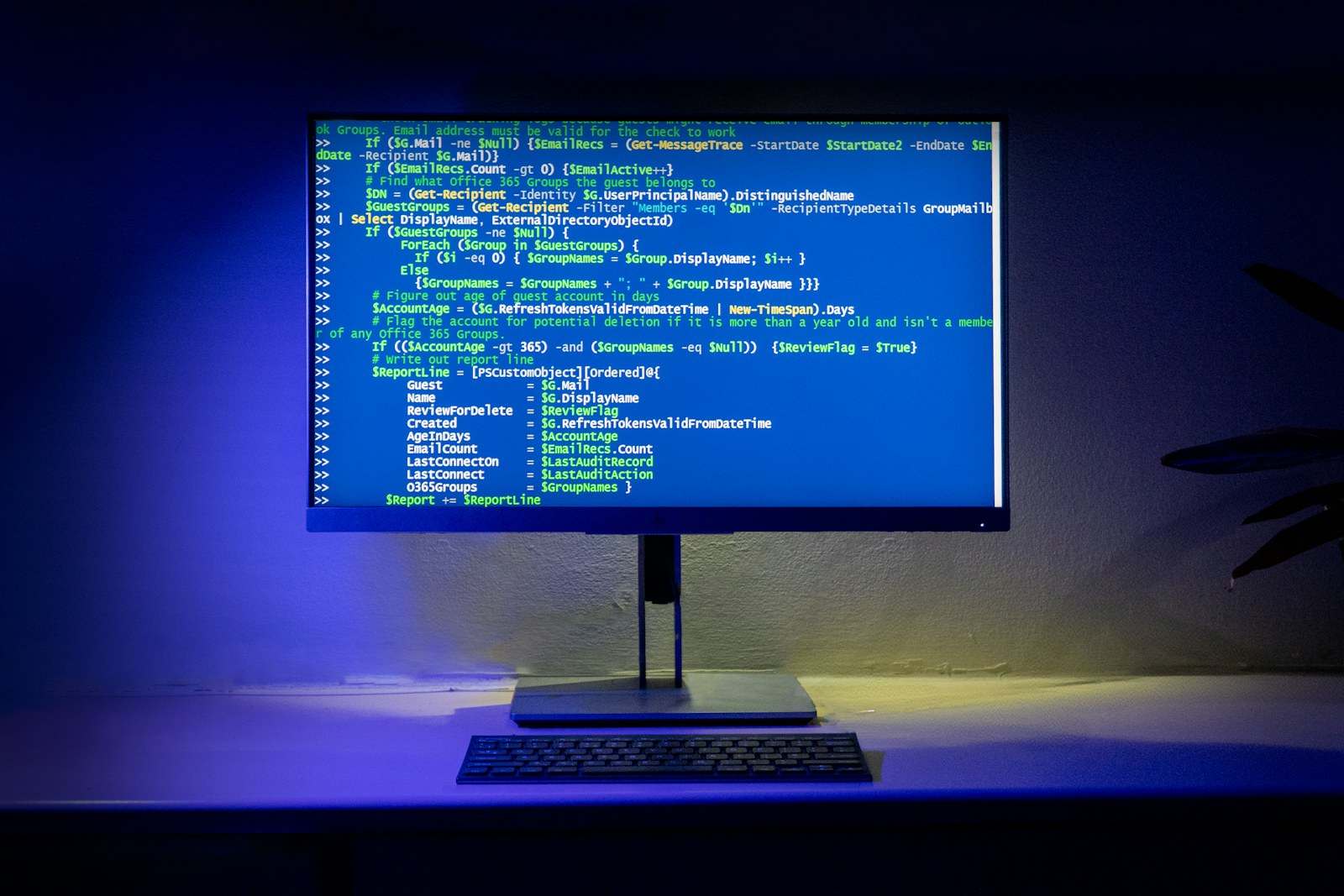 A computer screen displays code on a desktop