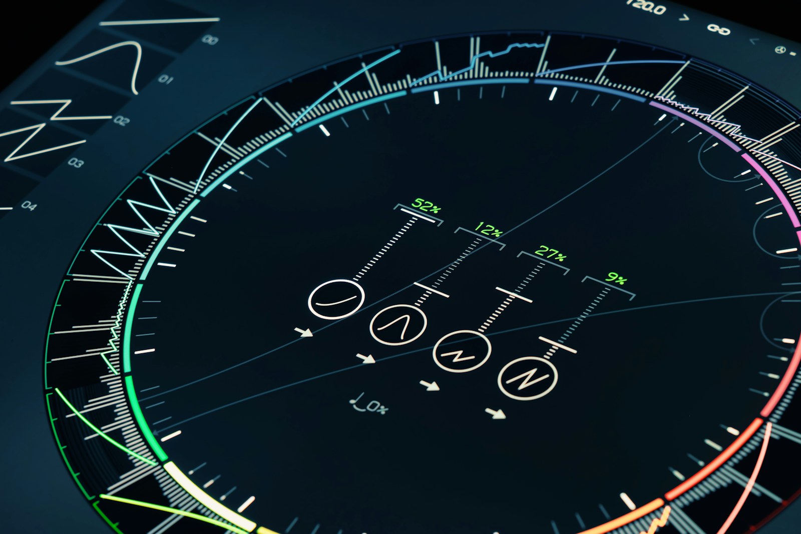 A close up of a watch face with different colors