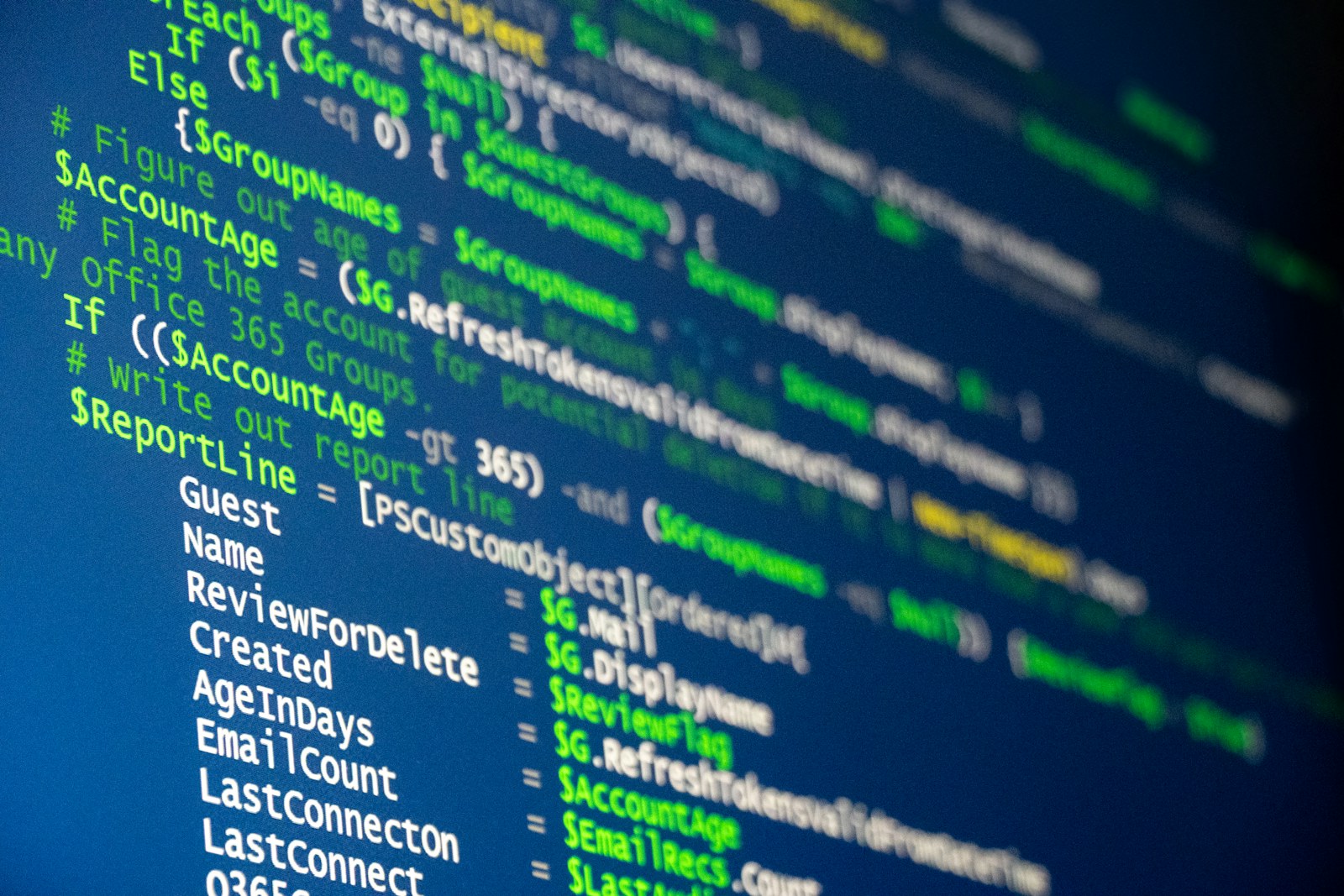 Computer code is displayed on a screen