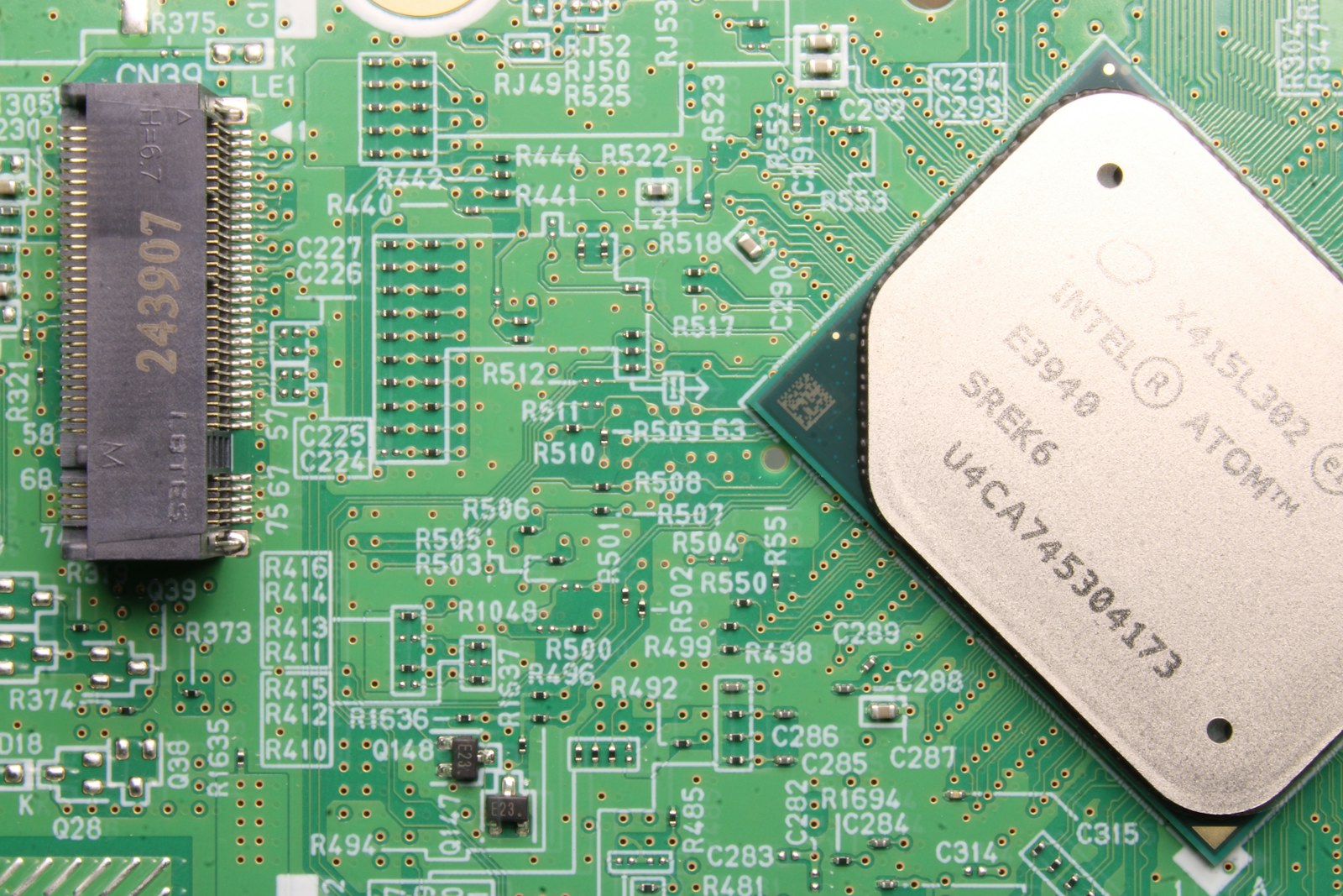 Close-up of a computer motherboard with processor and connector