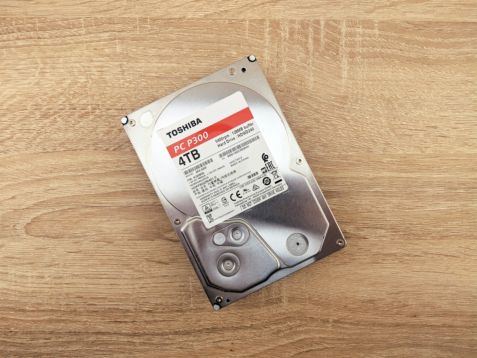 a hard drive sitting on top of a wooden table