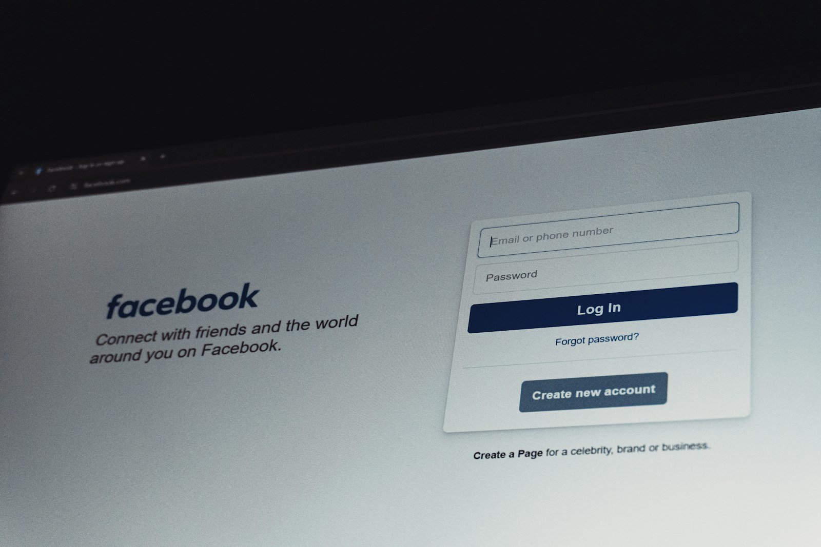 Facebook login screen on a computer monitor