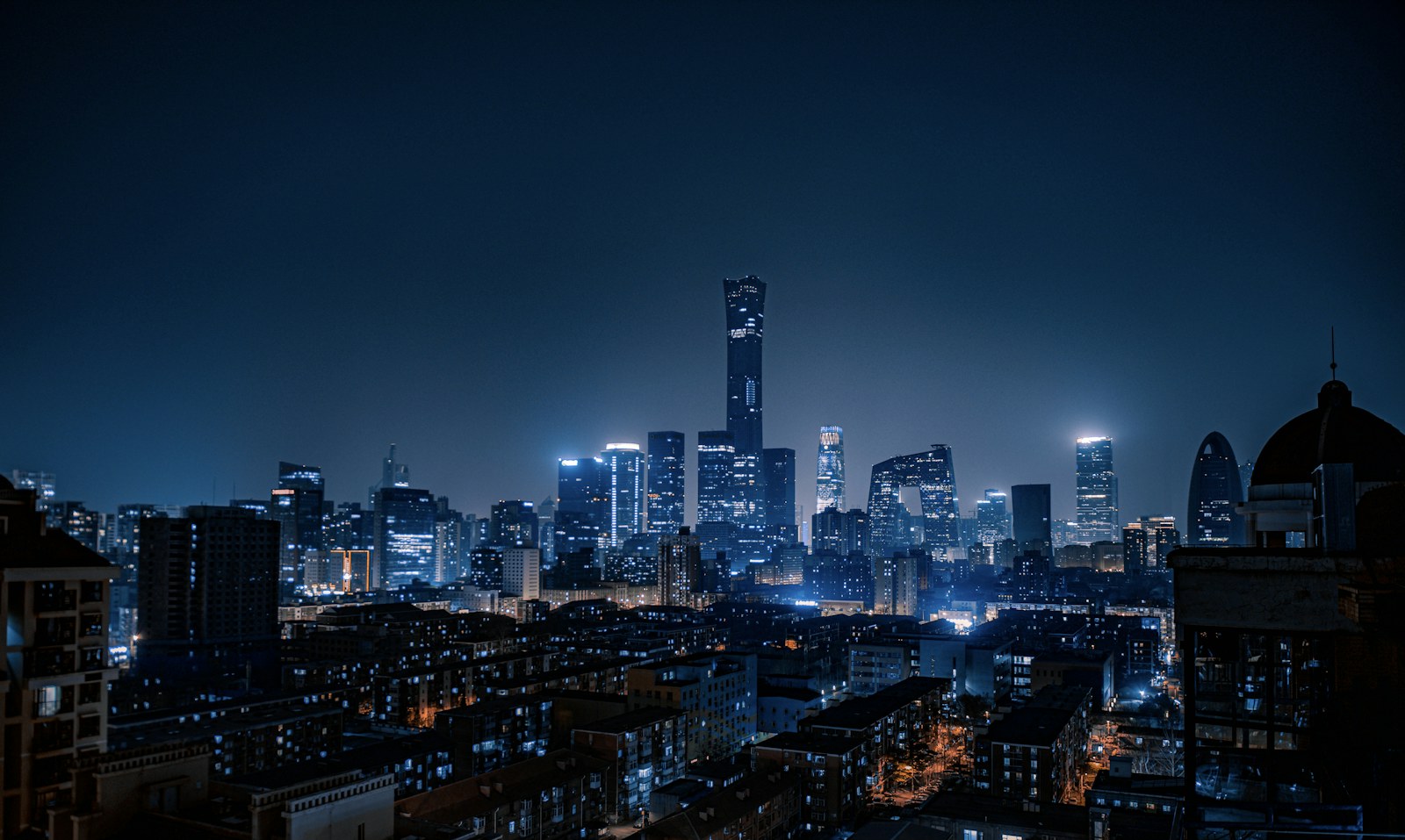 city skyline during night time